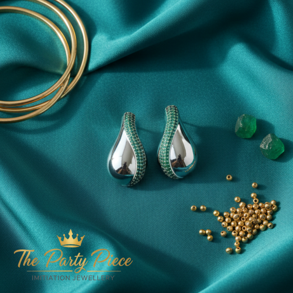 Emerald Sliver Teardrop Elegance Earring with white background 399rs by the party piece best artificial jewelry brand in india