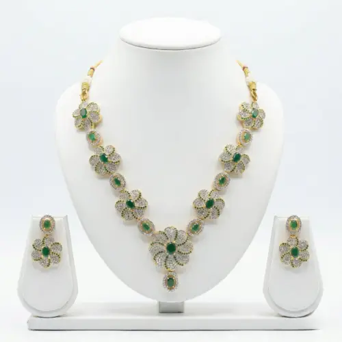 Green Crescent Floral Green American Diamond Necklace Set with white background by The Party Piece brand. best imitation jewelery brand in india