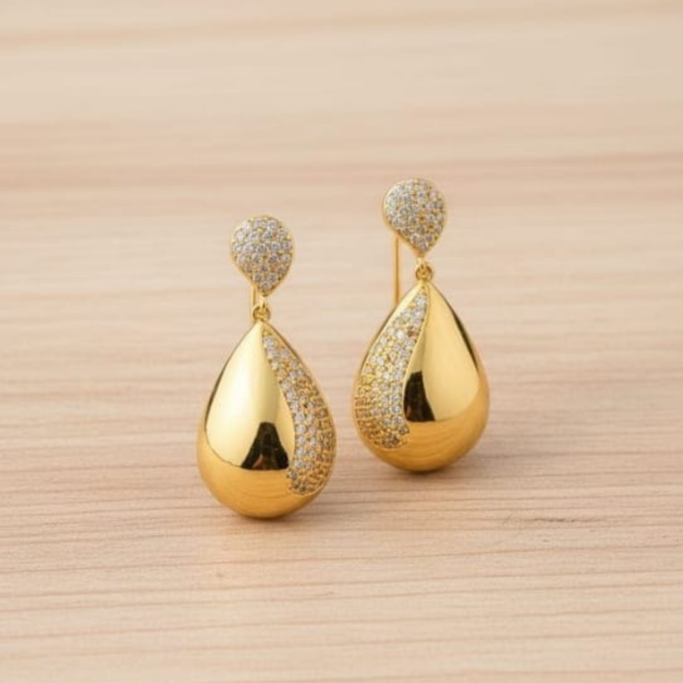 Luminous Pear Diamond Studs Earring with white background 399rs by the party piece best artificial jewelry brand in india
