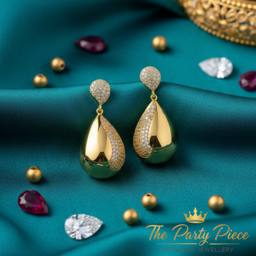 Luminous Pear Diamond Studs Earring with white background 399rs by the party piece best artificial jewelry brand in india