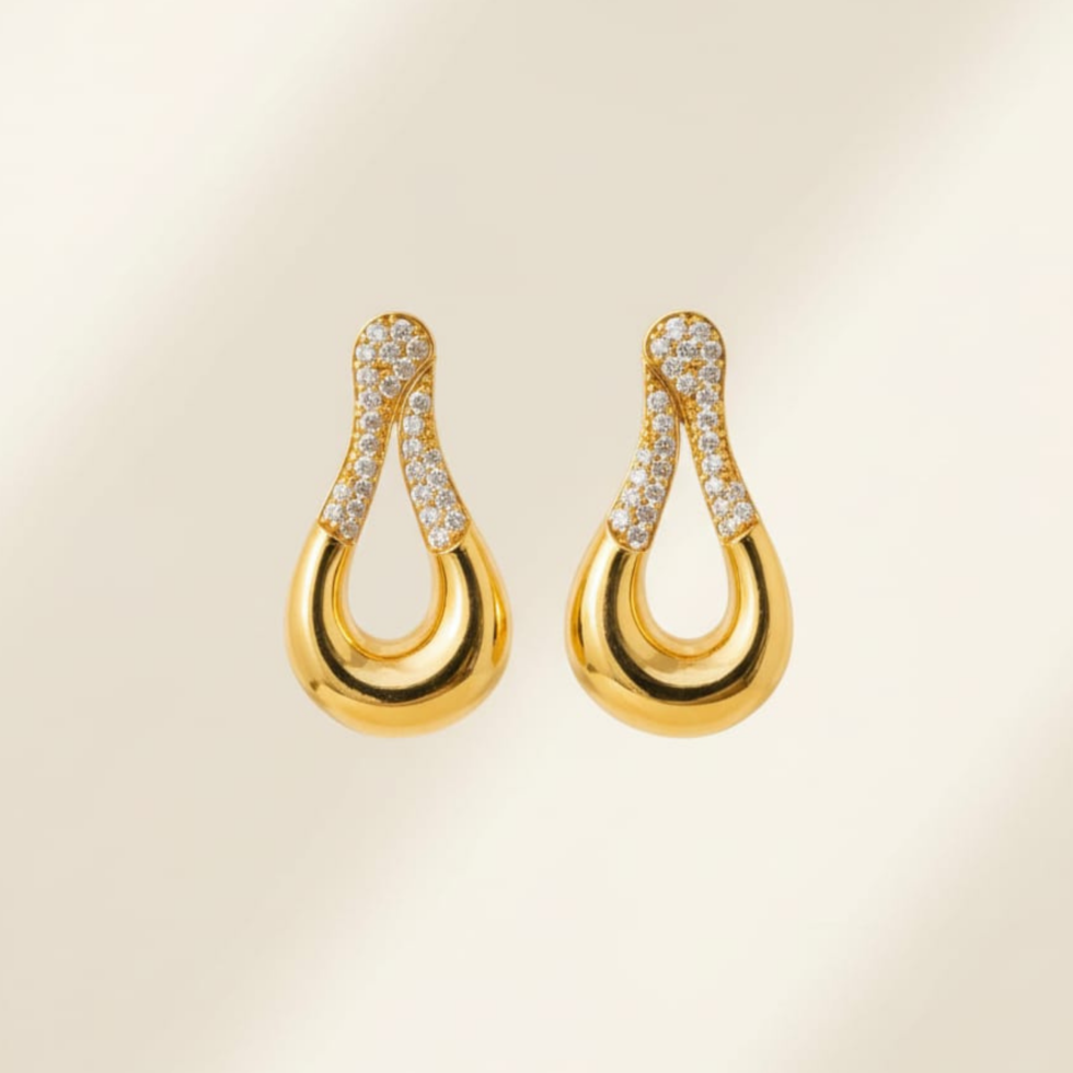 premium Liquid Loop earring with white background 385rs by the party piece